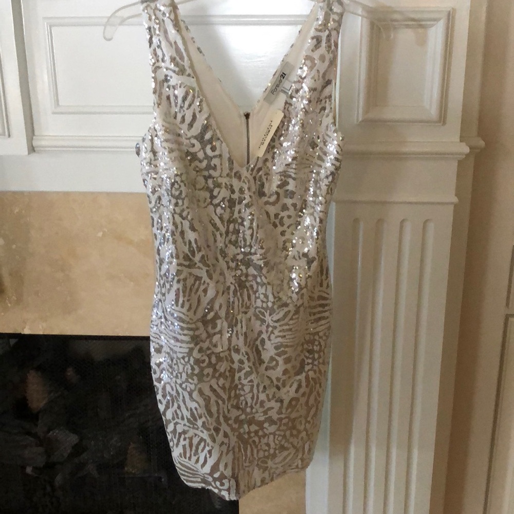 Silver and white sequin dress